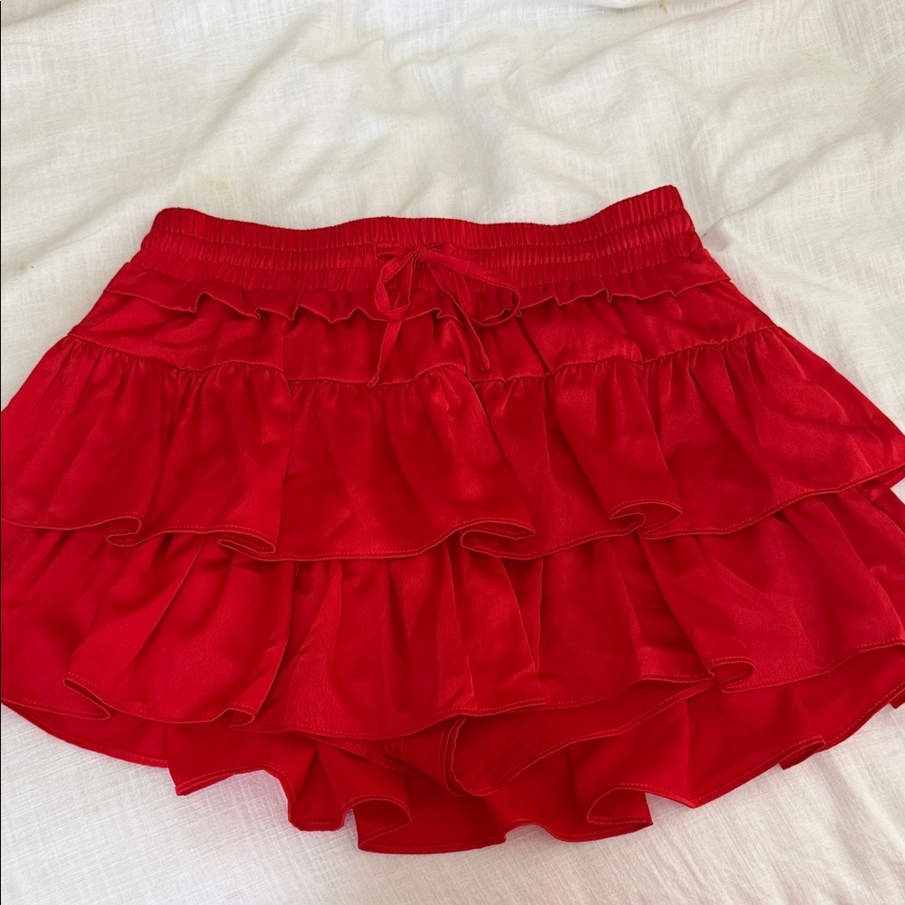Red ruffled skirt with shorts underneath